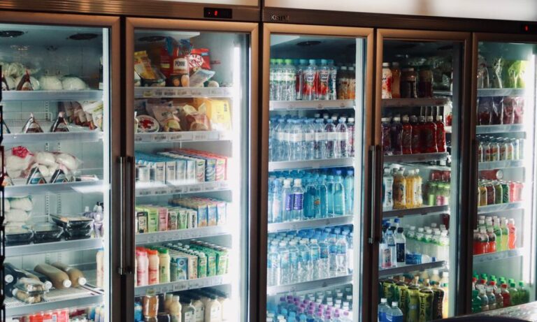 Row of refrigerators in store