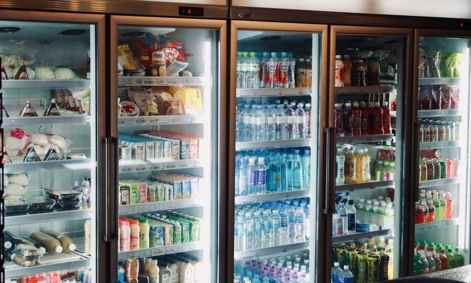 Row of refrigerators in store